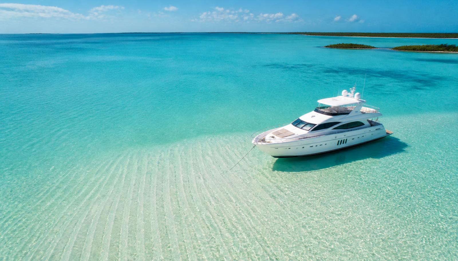 Yacht anchored over clear Florida water